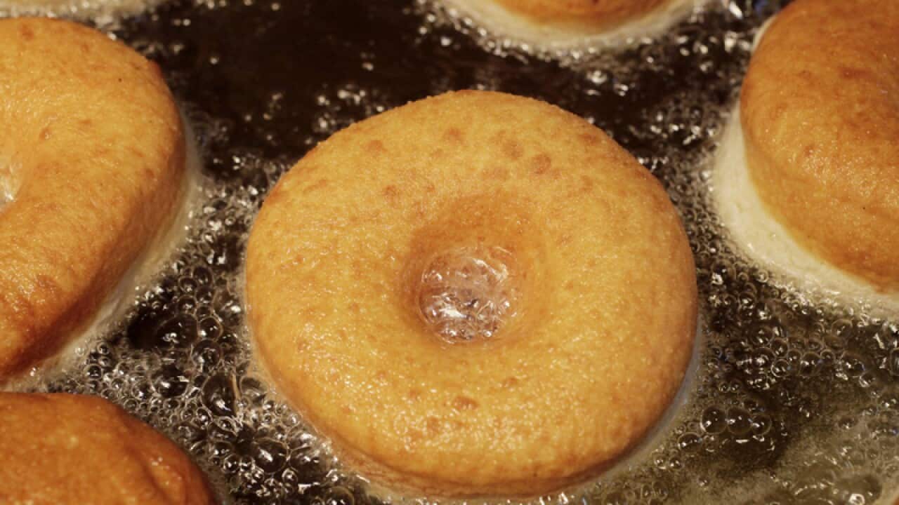 Doughnuts fired in cooking oil