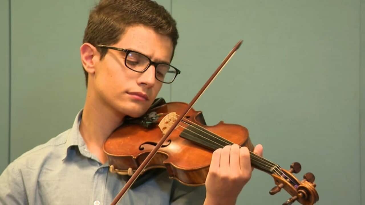 Violinist Aboud is self-taught - but after fleeing Syria he is showing his talents on stage in Australia