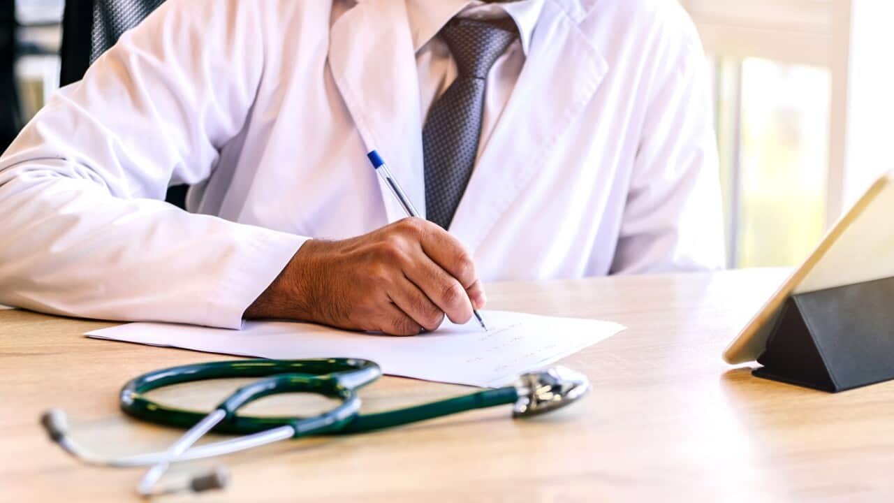Doctor writing medical prescription (Getty)..