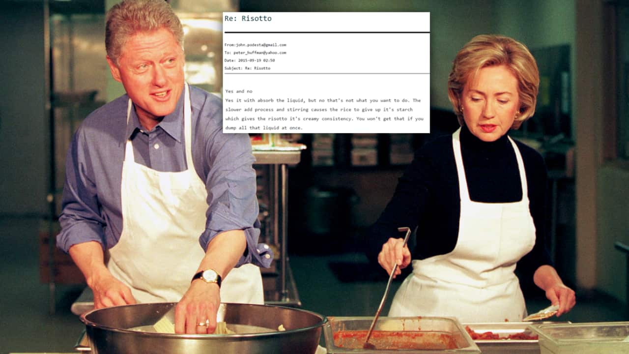 The Clintons at the DC Central Kitchen making lasagna to feed the homeless on December 21, 1998.