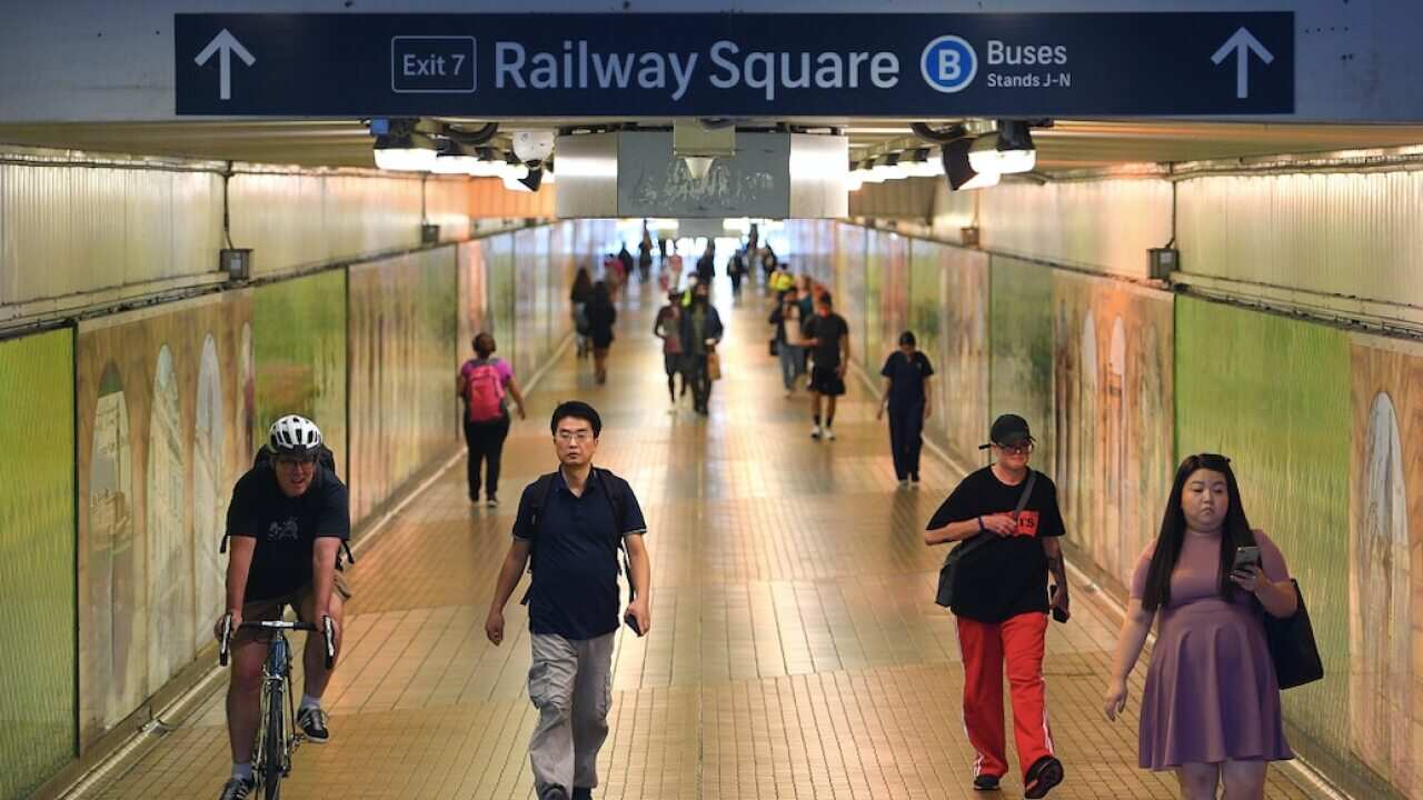 Commuters are seen at Central Station, Sydney.