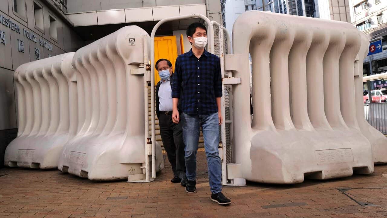 Pro-democracy politician Ted Hui leaving a Hong Kong police station in 2020