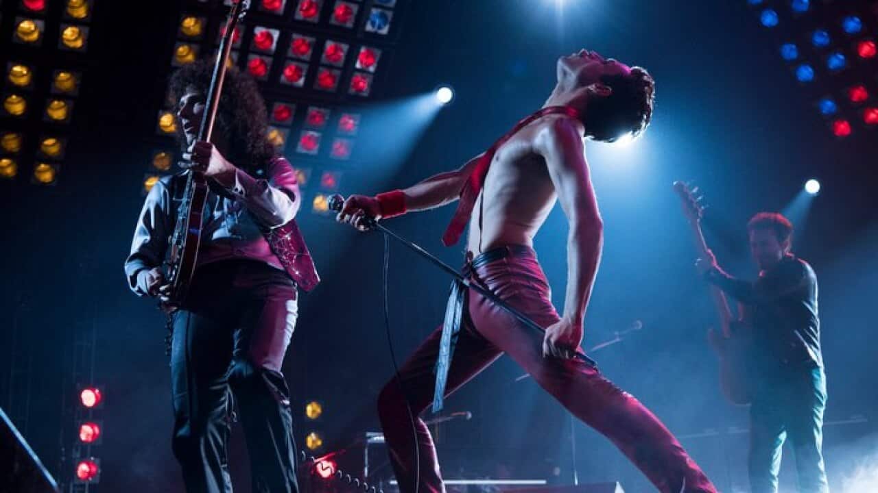 This image released by Twentieth Century Fox shows Gwilym Lee, from left, Rami Malek and Joe Mazzello in a scene from "Bohemian Rhapsody." (Alex Bailey/Twentieth Century Fox via AP)