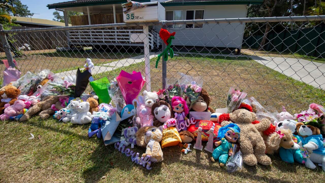Tributes at the Brisbane house where two little girls died in a hot car parked outside in November
