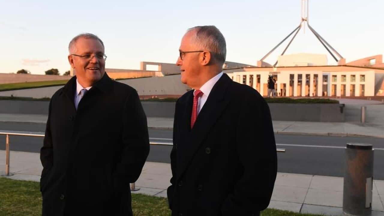Scott Morrison and Malcolm Turnbull outside Parliament House.