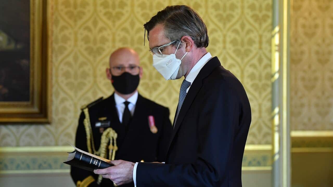 NSW Premier Dominic Perrottet is sworn in by New South Wales Governor Margaret Beazley at NSW Government House in Sydney, Tuesday, October 5, 2021. (AAP Image/Joel Carrett) NO ARCHIVING