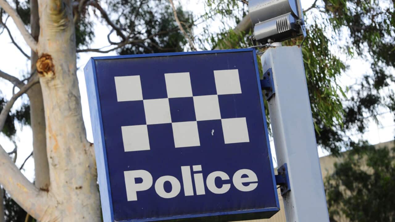 A police station sign