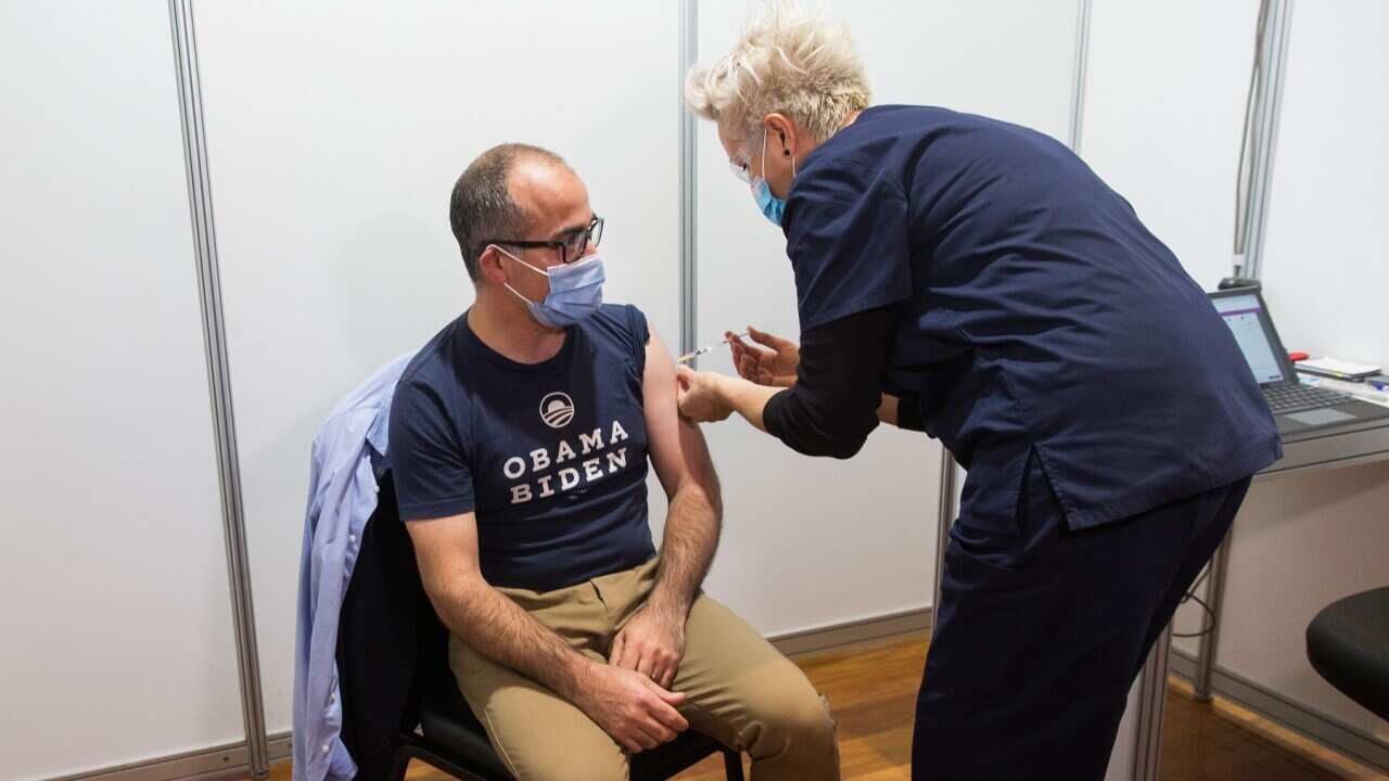 Acting Victorian Premier James Merlino receives a COVID-19 vaccine at the Royal Exhibition Building vaccination hub in Melbourne, Friday, May 28, 2021. (AAP Image/Pool, Paul Jeffers) NO ARCHIVING