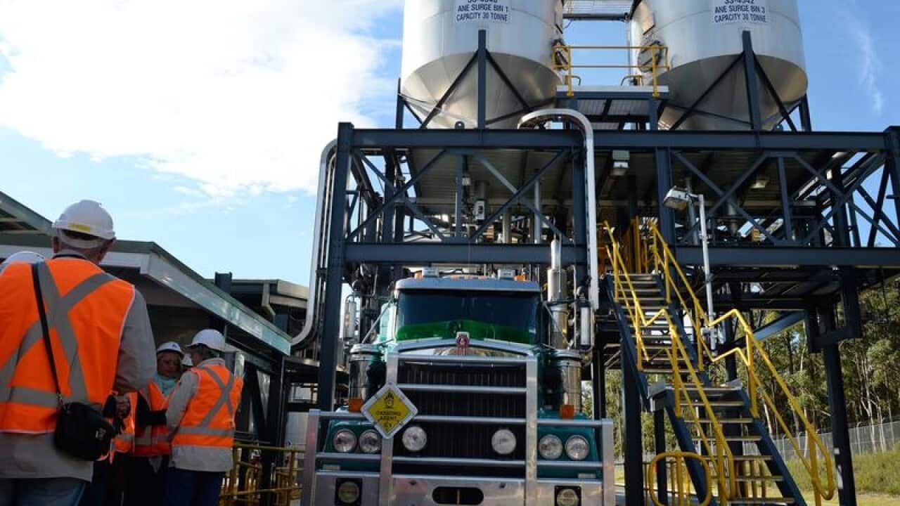 workers and truck at Orica's Kurri Kurri plant