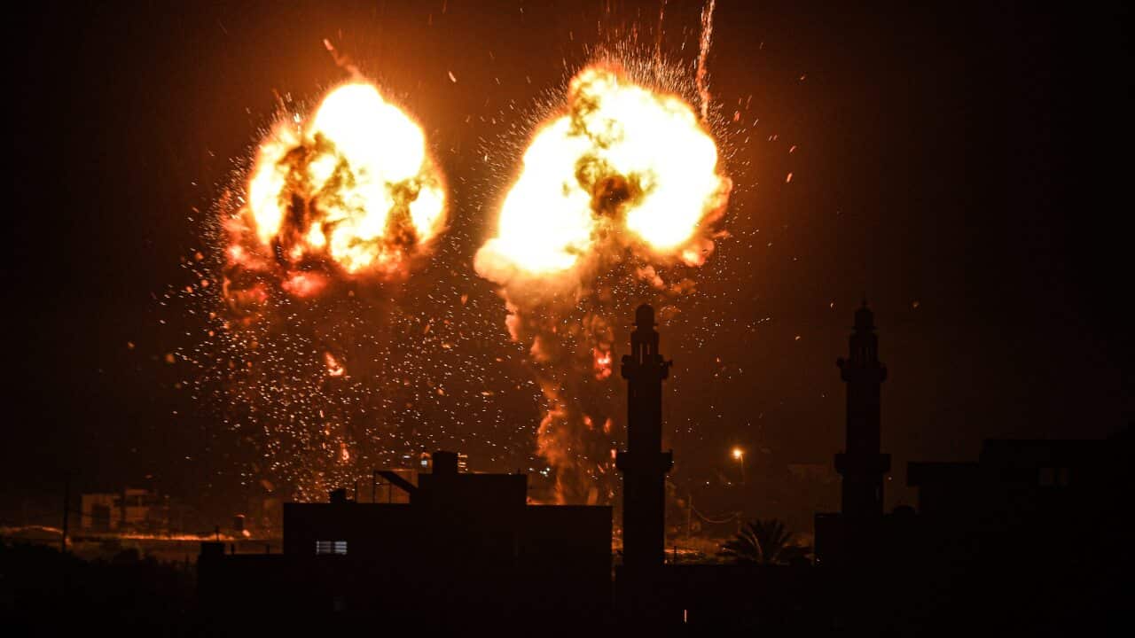 Flames are seen after an Israeli air strike hit Gaza City earlier this week.