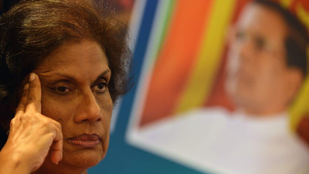 Sri Lankas former president Chandrika Kumaratunga looks on during a press conference in Colombo on December 22, 2014.