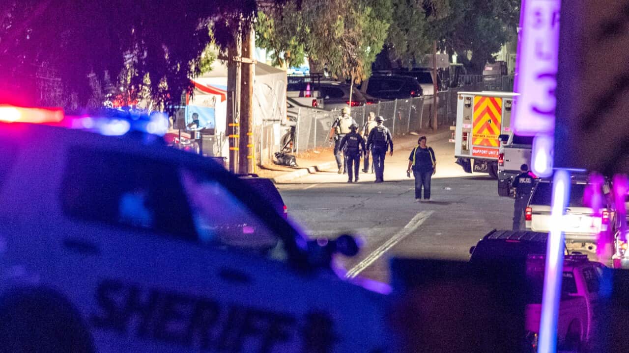 Law enforcement officers from multiple agencies continue to investigate the scene where killed and another 15 injured during the Gilroy Garlic Festival. 
