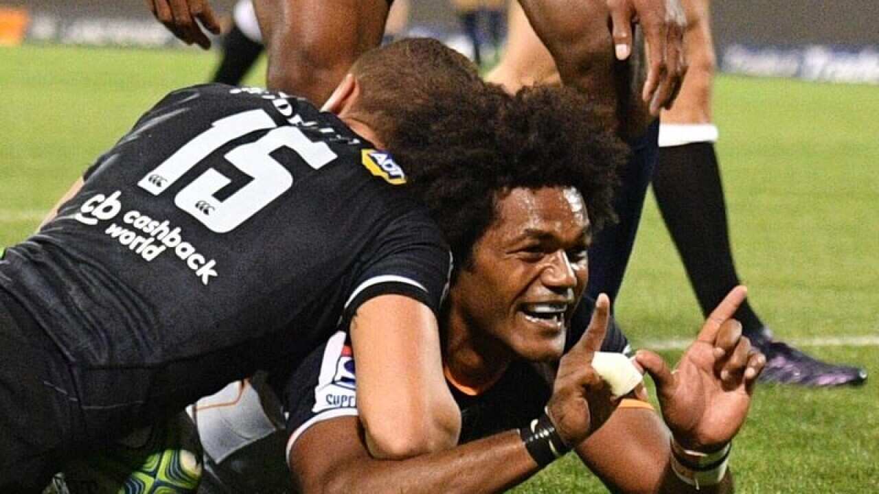 Brumbies Henry Speight scores a try.