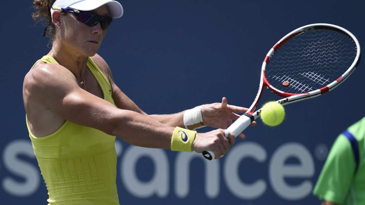 Samantha Stosur returns a ball.