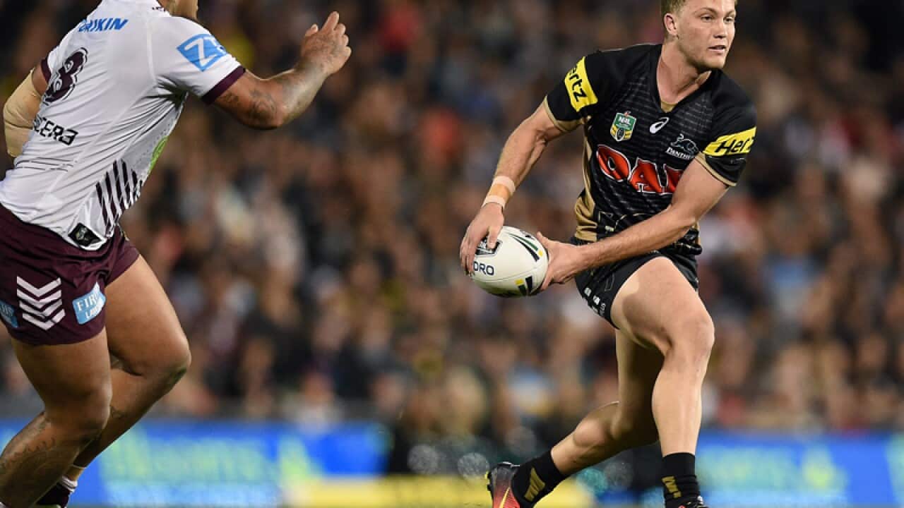 Matt Moylan of the Panthers looks to pass the ball