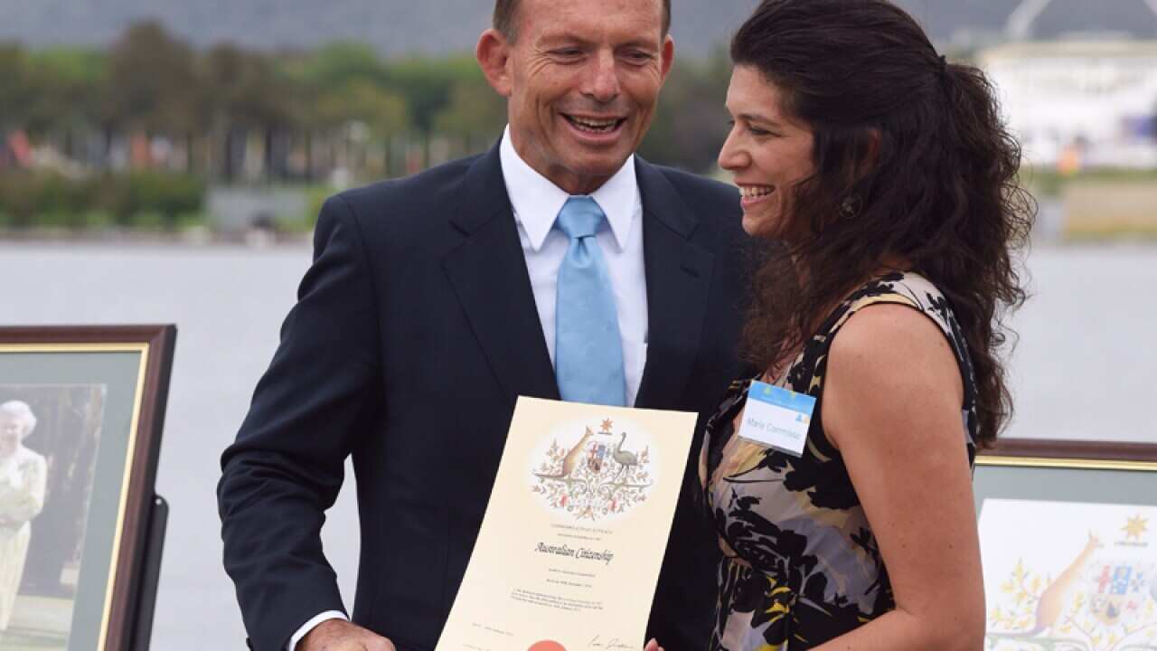 Prime Minister Tony With new Australian citizen Marie Commisso