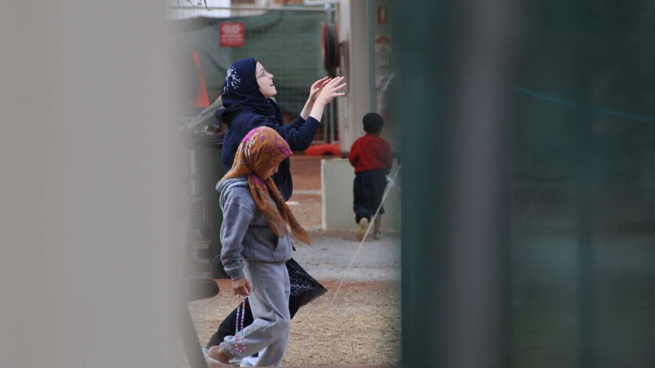Asylum seekers in detention - AAP.jpg
