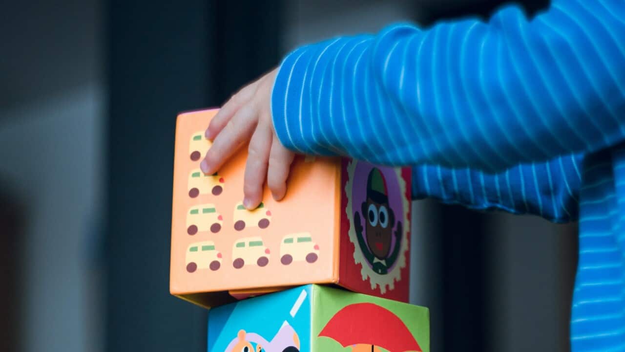 A child is playing block at a childcare centre by Markus Spiske via Unsplash.jpg