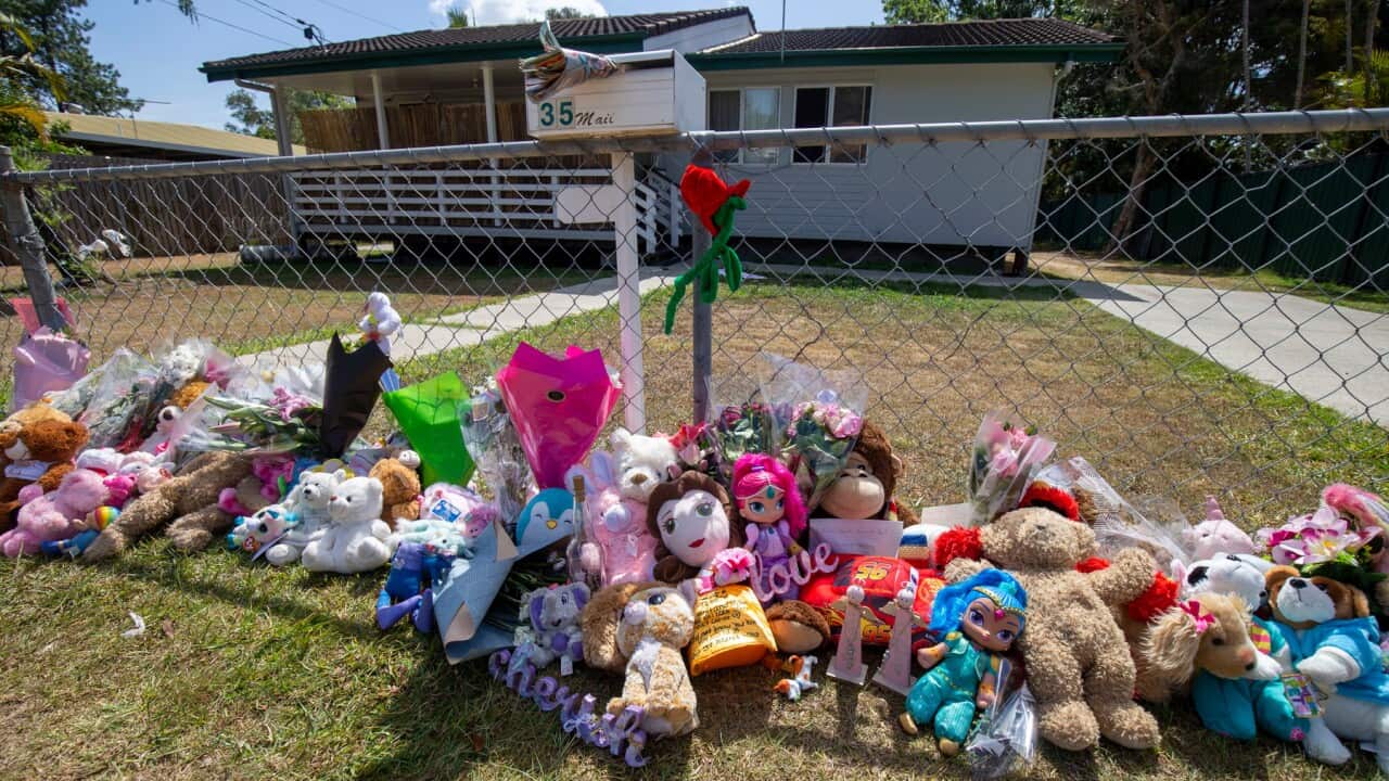 outside a house in Brisbane where 2 children found dead in car