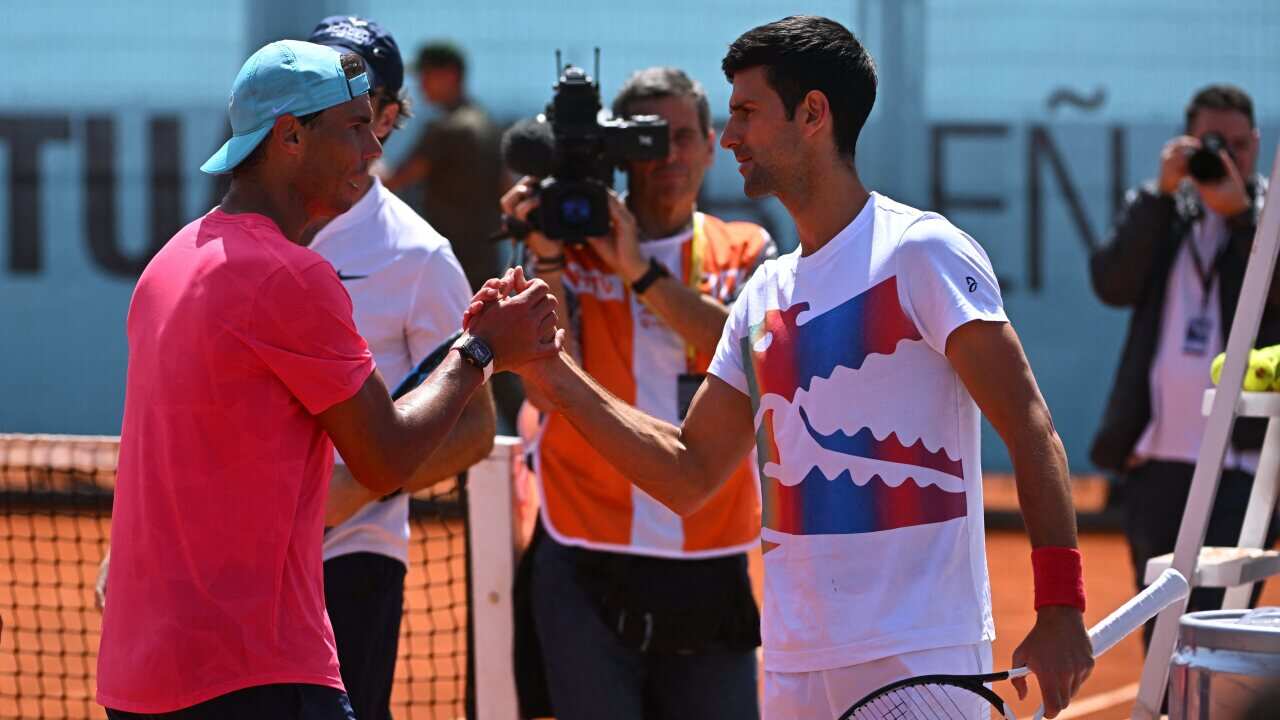 Rafael Nadal (ESP) with Novak Djokovic (SRB) during practice at the Mutua Madrid Open in Madrid, Spain, May 1, 2022. Photo by Corinne Dubreuil/ABACAPRESS.COM.