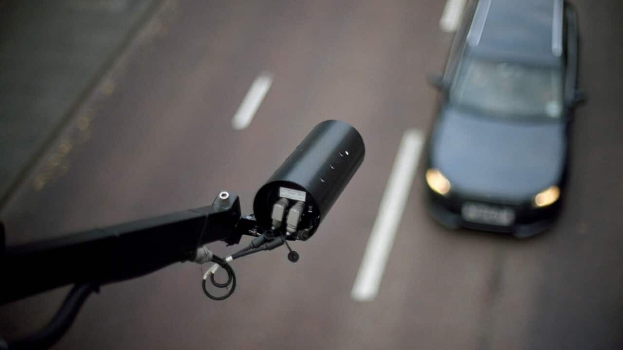 CCTV pointing on car - view from above, blurred background