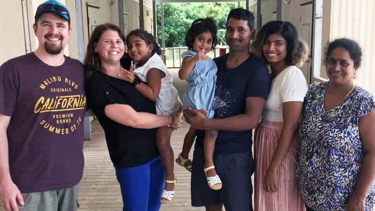 Angela Fredericks (second from left) with Priya-Nades family.