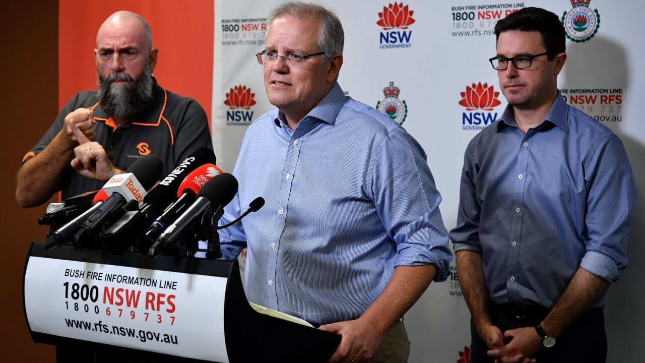 Prime Minister Scott Morrison speaks to the media after touring the NSW Rural Fire Service control room in Sydney, Sunday, December 22, 2019.