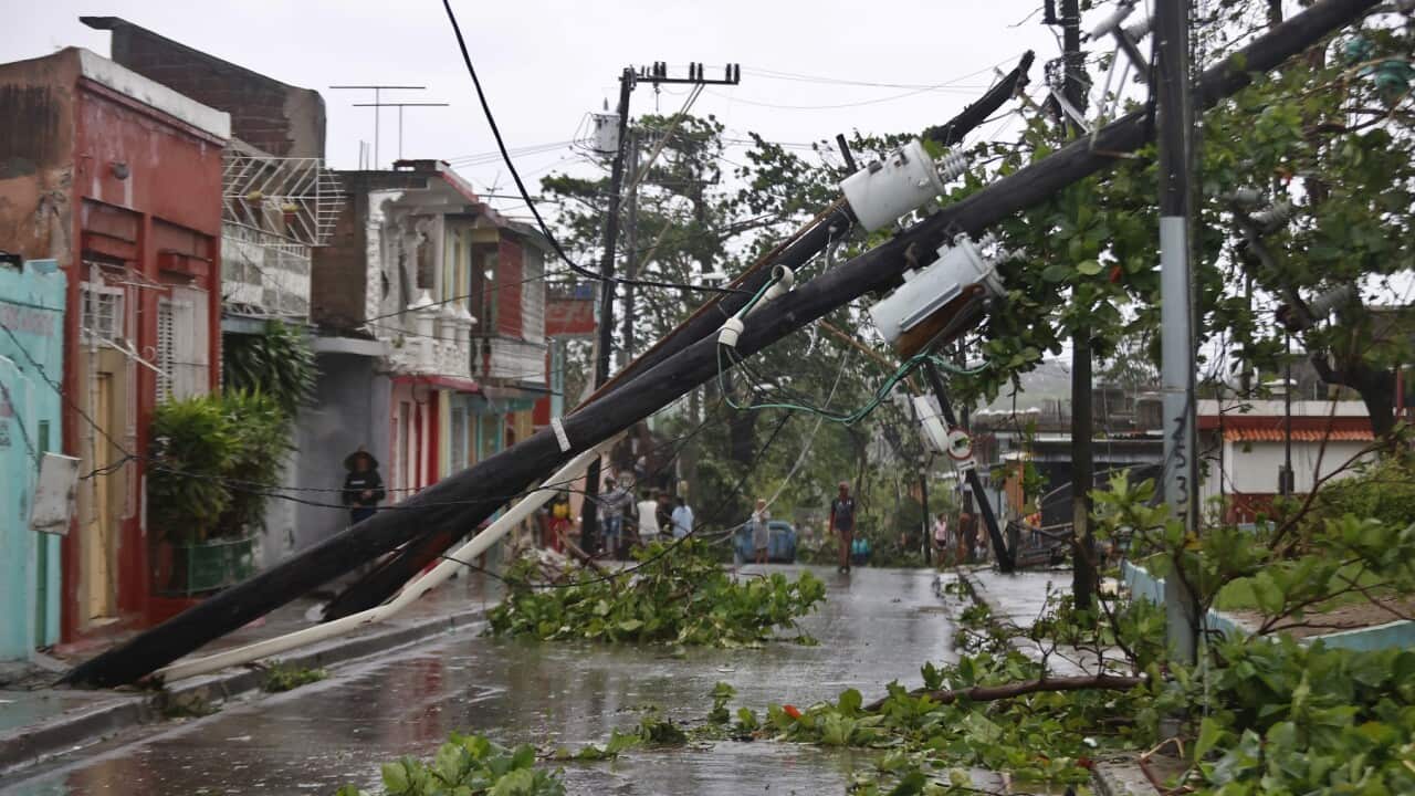 Fallen trees and flooded streets.