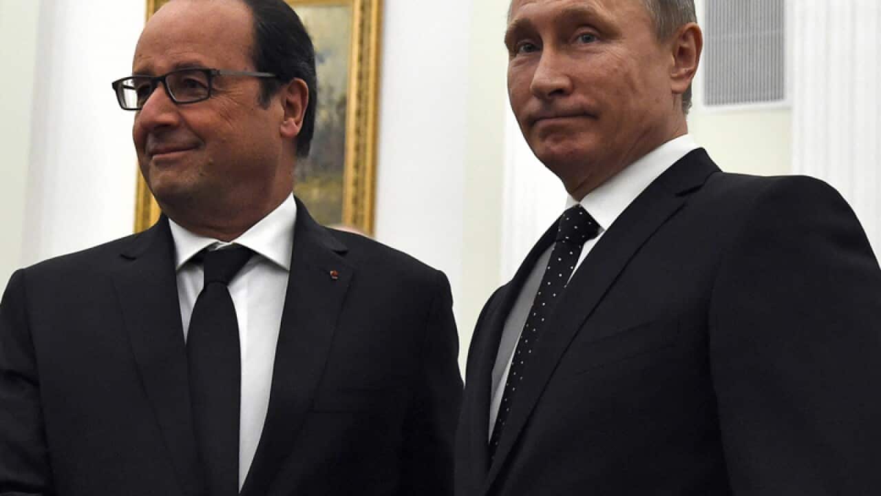 Vladimir Putin, right, Francois Hollande
