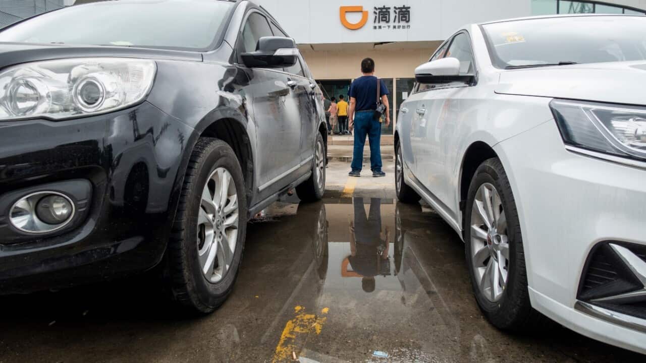 Cars are parked in front of a Didi Club of the taxi-hailing and car-service app Didi Chuxing in Shanghai, China, 26 May 2018. 