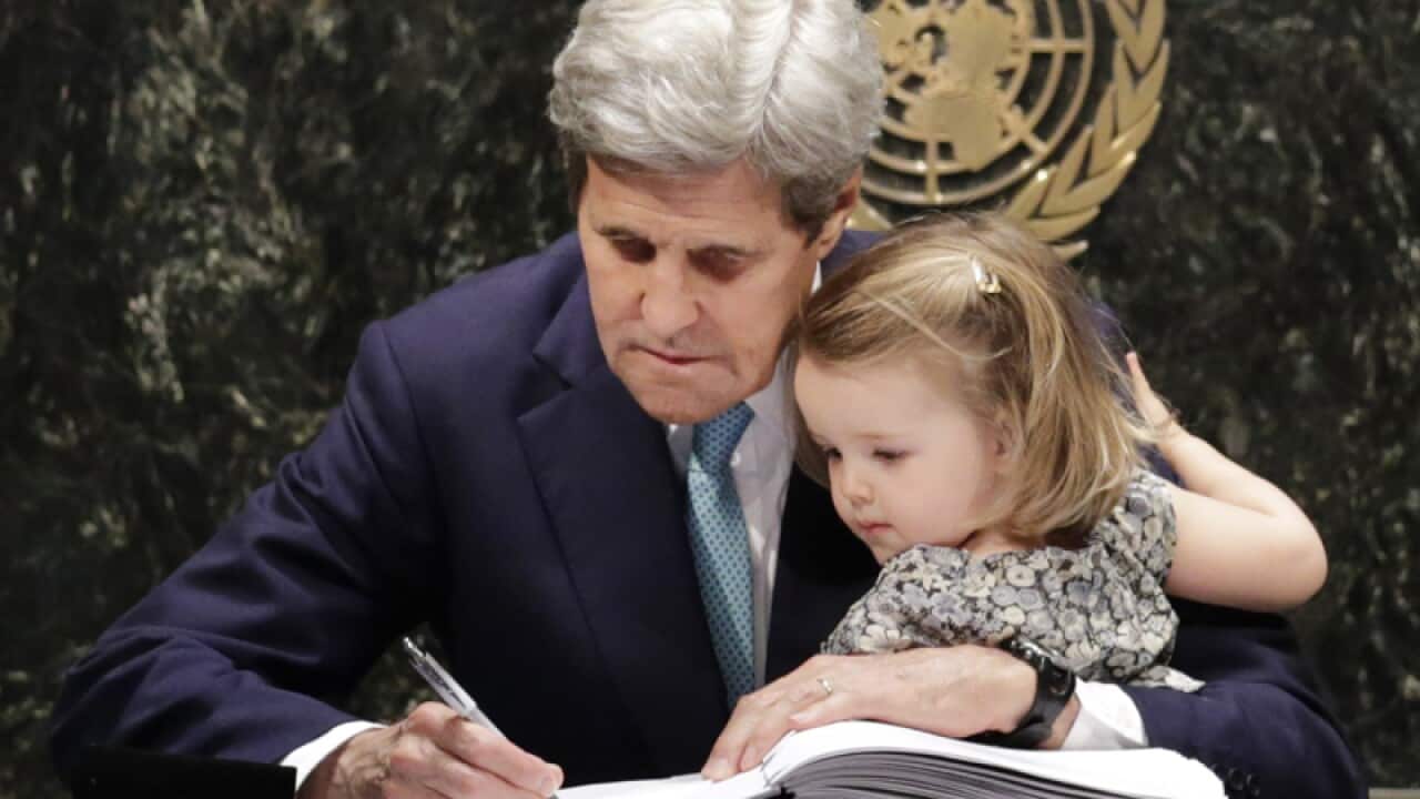 US Secretary of State John Kerry with his granddaughter