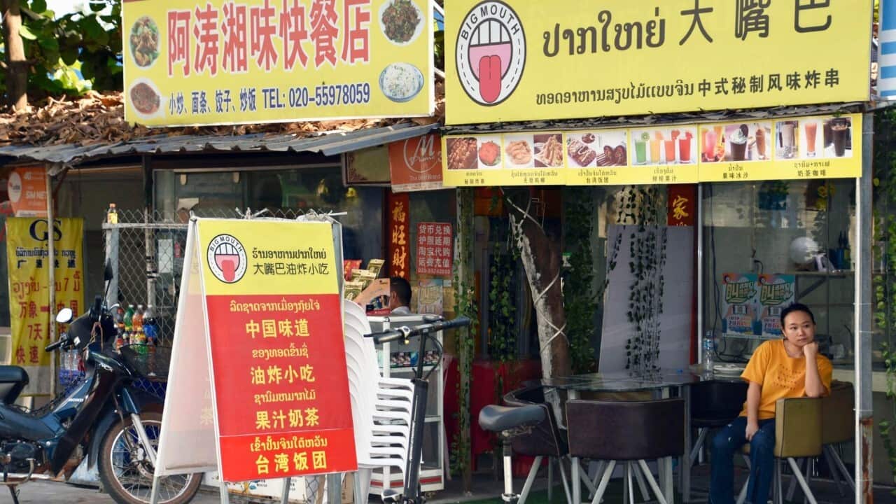 Laos locked down its capital and closed its international borders to most traffic Thursday, April 22, 2021 (AAP image - Kyodo News via AP)