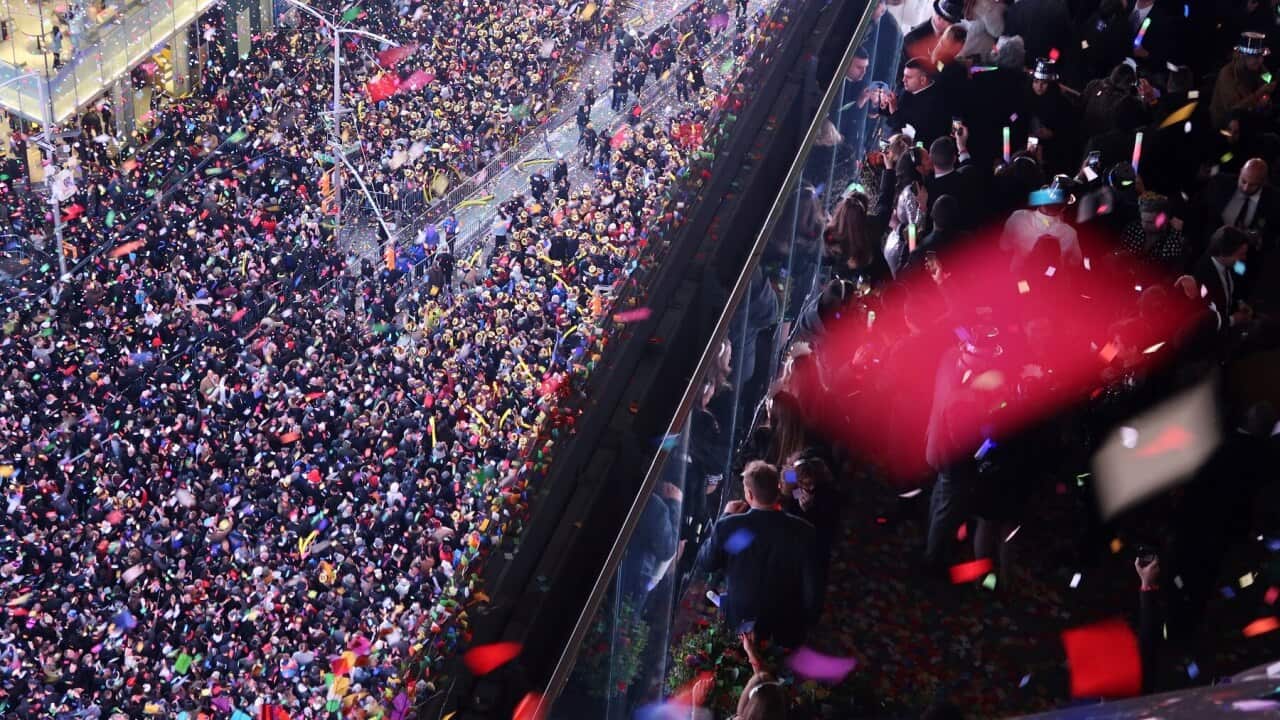 Confetti and pre-social distancing crowds greet 2020 in New York's Times Square