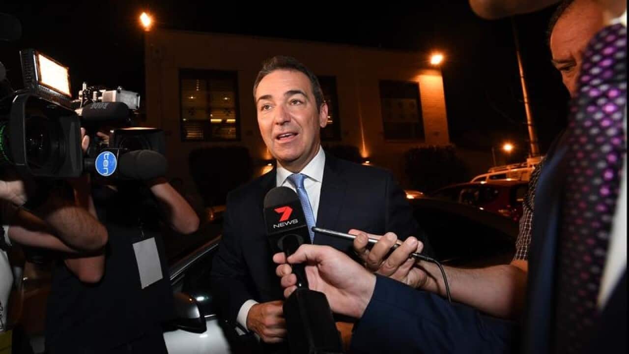 SA Liberal leader Steven Marshall arrives to claim victory.