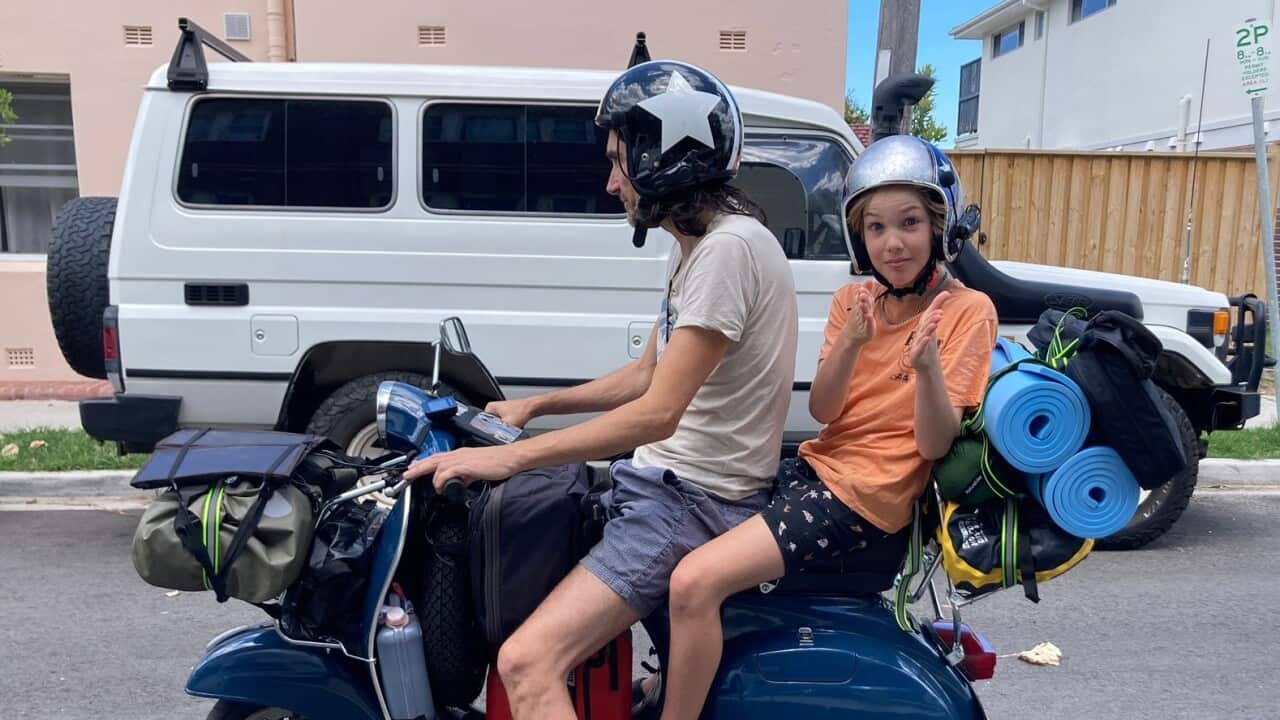 Mario and Leonardo Gabrieli on their Vespa, before leaving.