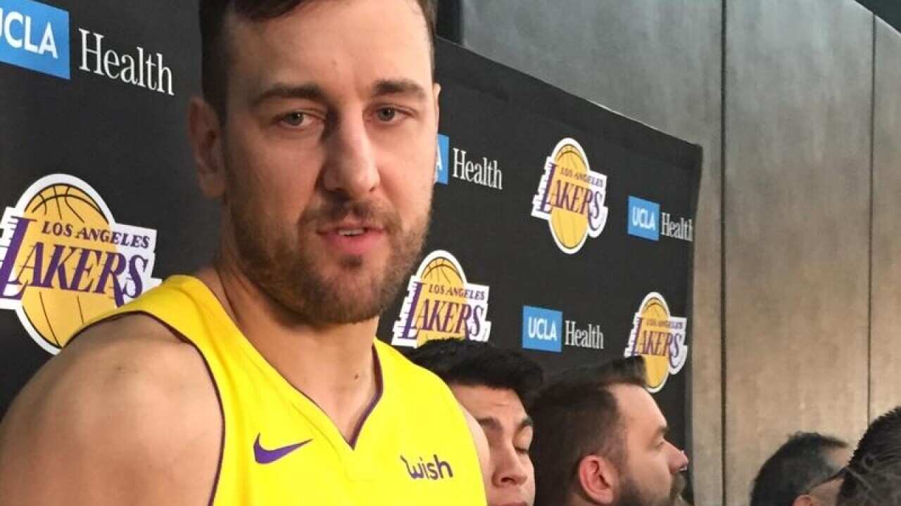 Andrew Bogut speaks to the media