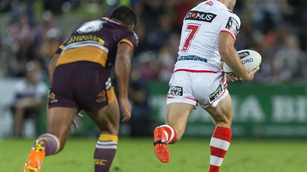 Ben Hunt of the Dragons intercepts and scores a try against Brisbane.