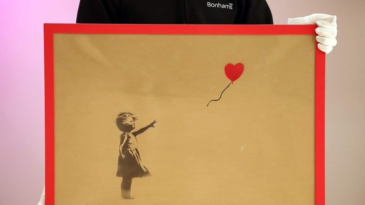 2012: Banksy's 'Girl and Balloon' which was painted on an Ikea frame at Bonhams auctioneers.