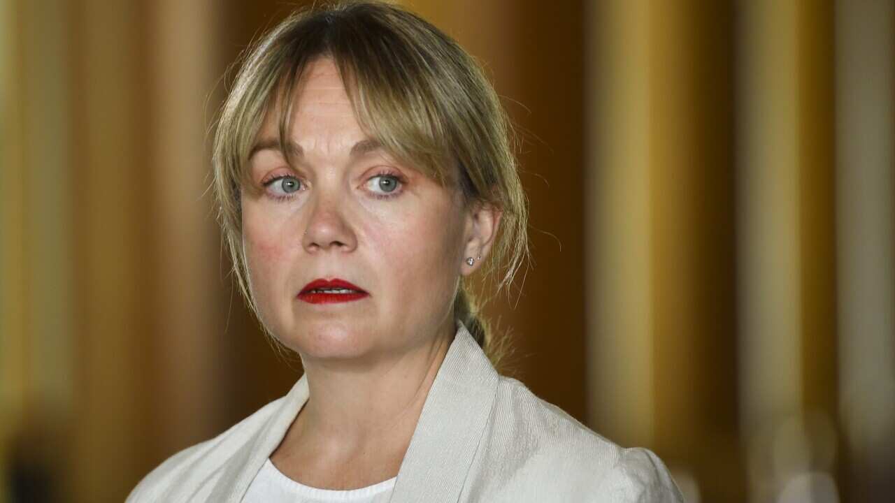 Former staffer to Australian Education Minister Alan Tudge Rachelle Miller speaks to the media during a press conference at Parliament House in Canberra, Thursday, December 2, 2021. (AAP Image/Lukas Coch) NO ARCHIVING