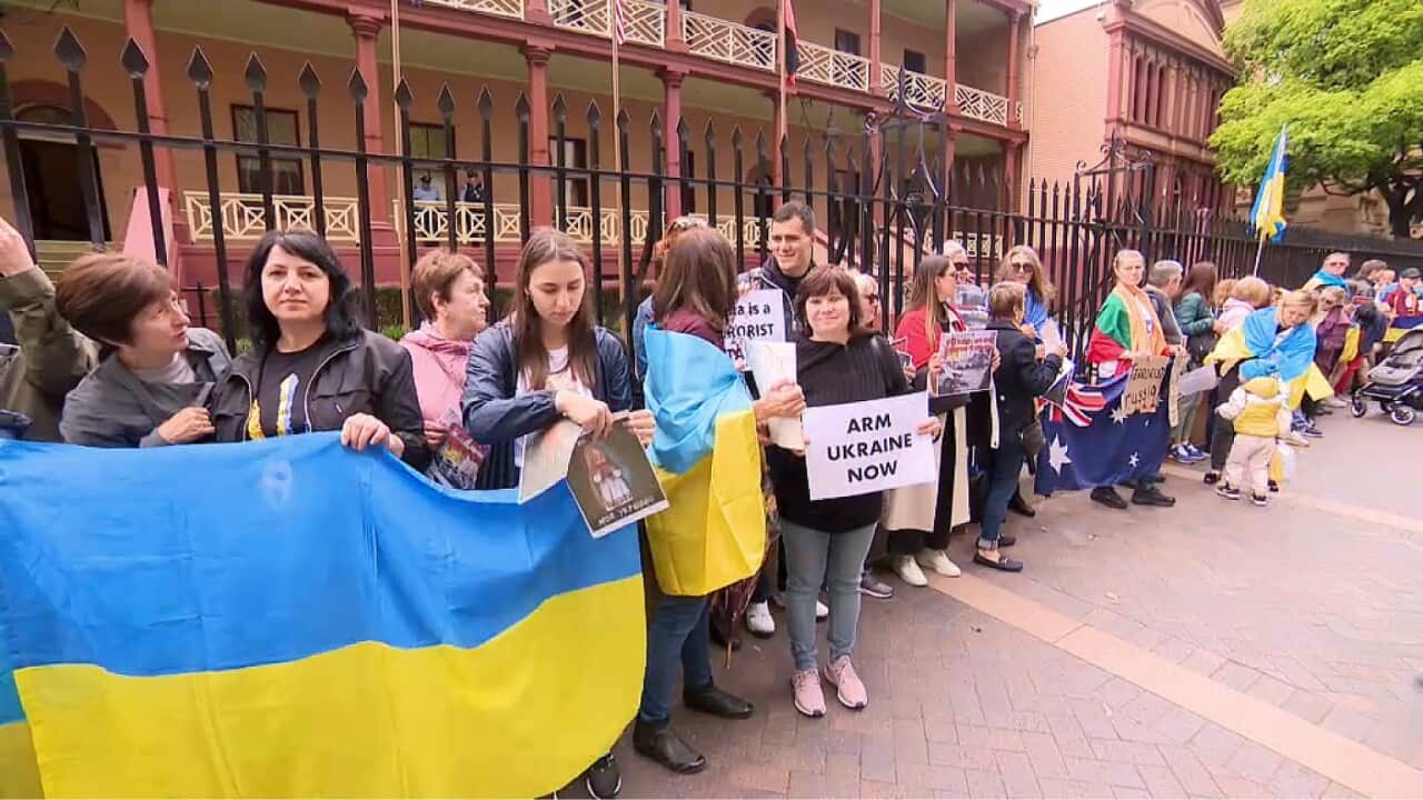 Ukrainian Australians stage a protest outside NSW Parliament House