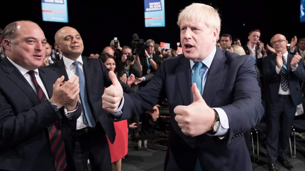 Prime Minister Boris Johnson gives a thumbs up after delivering his speech