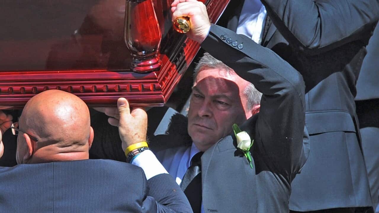 Borce Ristevski at his wife's funeral.