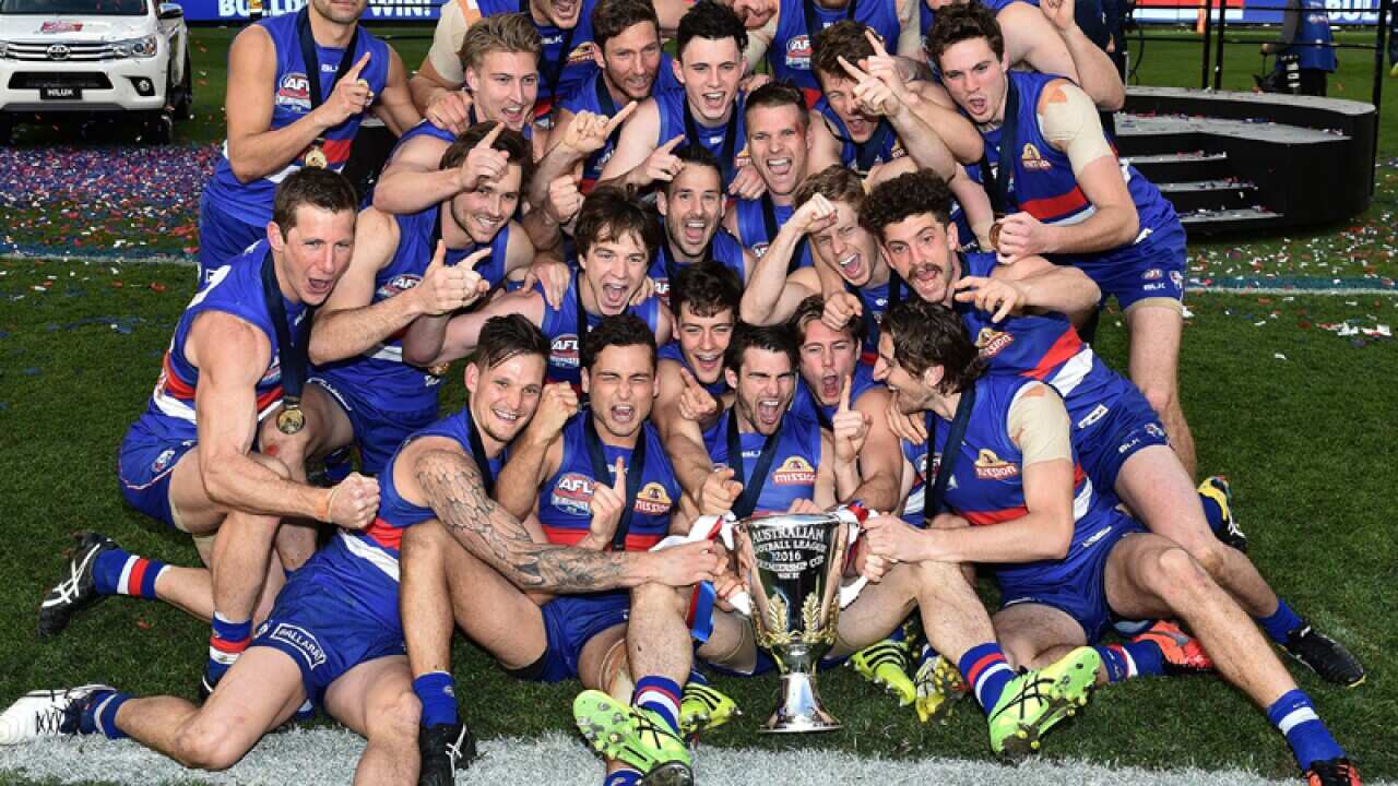 Western Bulldogs players with the AFL premiership trophy