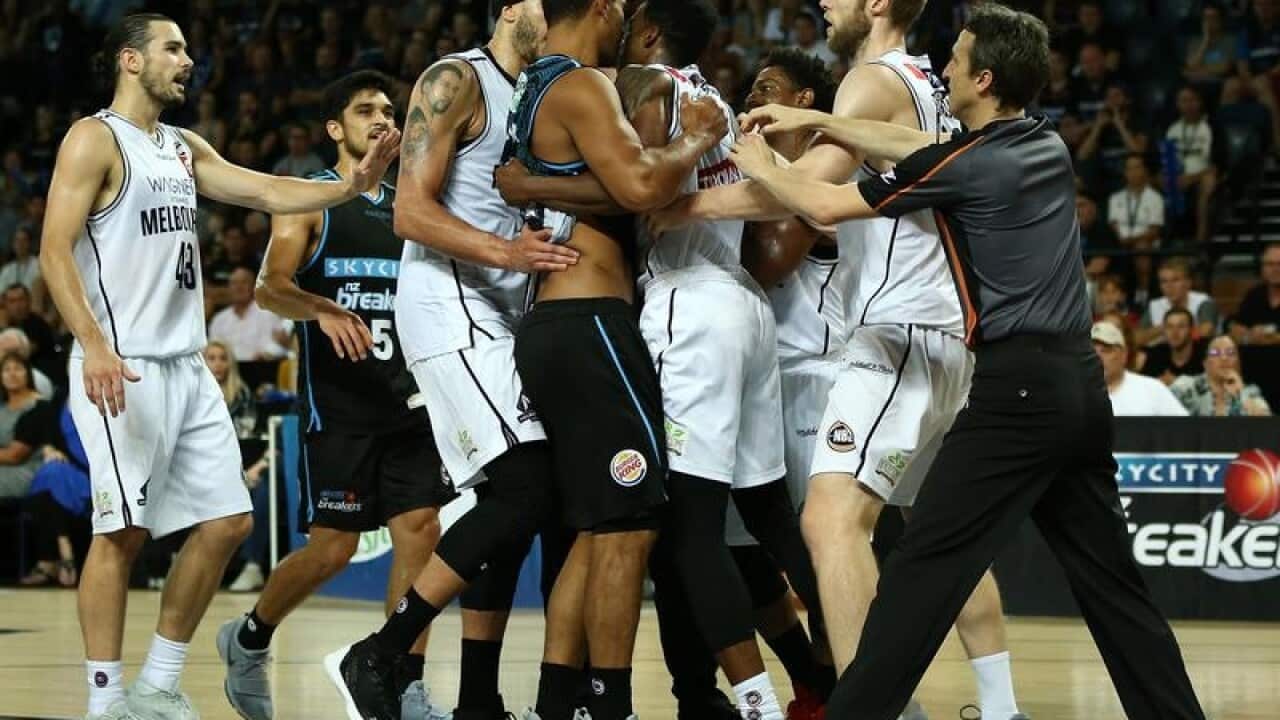 NZ Breakers' Mika Vukona and Carrick Felix of United clash in the NBL