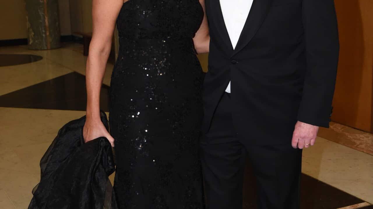 Peta Credlin and husband Brian Loughnane arrive for the Mid Winter Ball at Parliament House in Canberra, Wednesday, June 17, 2015.  (AAP Image/Mick Tsikas) NO ARCHIVING