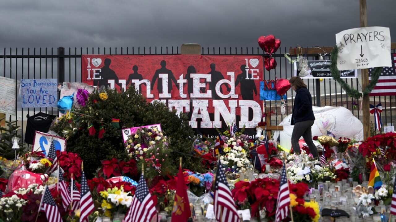 Tributes at a makeshift memorial at the Inland Regional Center