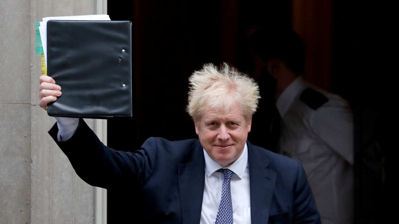 Britain's Prime Boris Johnson leaves 10 Downing Street to attend the weekly Prime Ministers' Questions session.