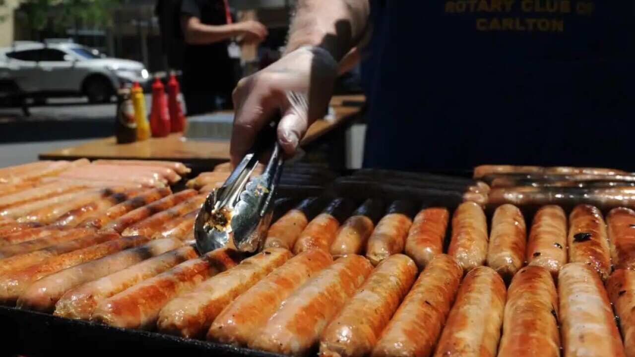 A sausage sizzle outside a polling station at the University High School in Melbourne.