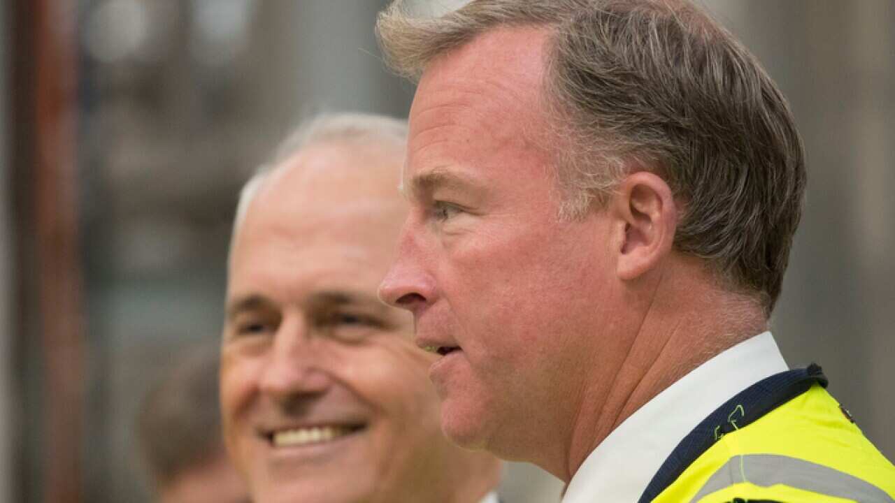 Tasmanian Premier Will Hodgman (right) and Australian Prime Minister Malcolm Turnbull speak to the media during a visit to the Norske Skog Boyer Mill near Hobart, Friday, February 16, 2018. (AAP Image/Rob Blakers) NO ARCHIVING