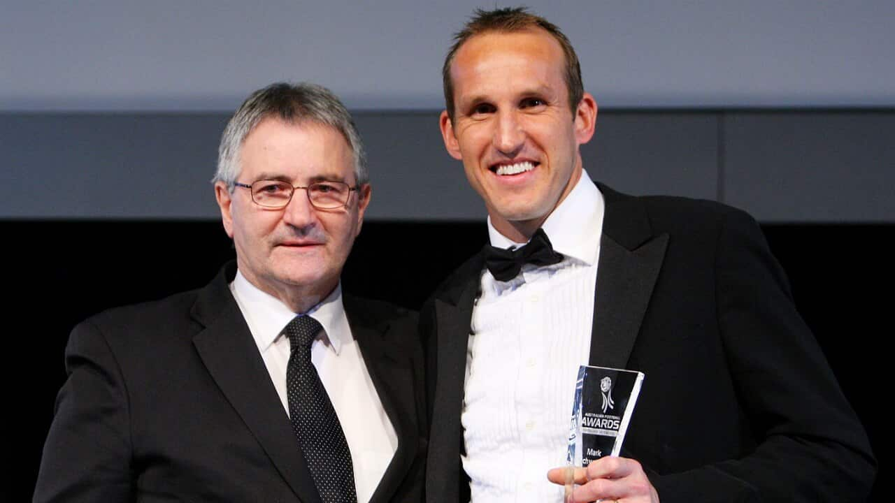 Jack Reilly with Mark Schwarzer